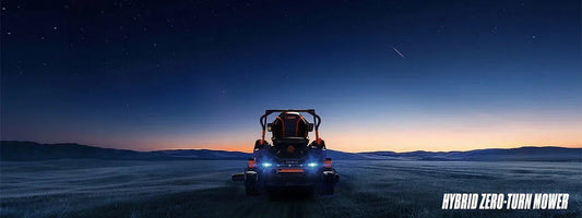 Hybrid zero-turn lawn mower at dusk on open field under starry sky with shooting star
